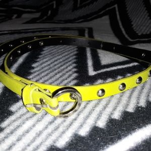 Lime green skinny belt w/ silver buckle and studs